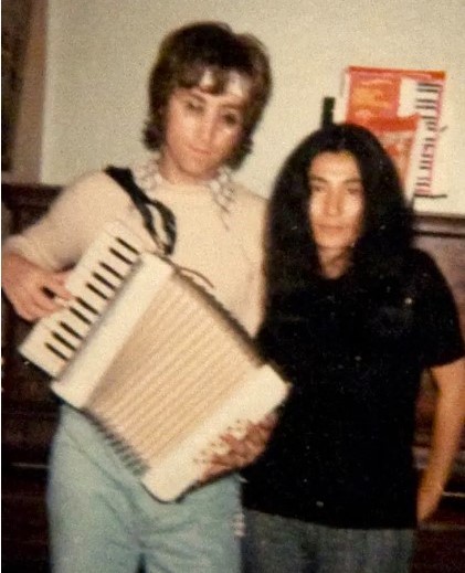 John Lennon on an accordion 